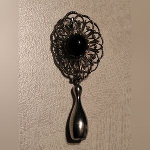 Black silver tone Vintage fillagree dangle brooch